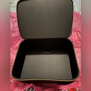 YSL Makeup carrying case. Zipper all around.